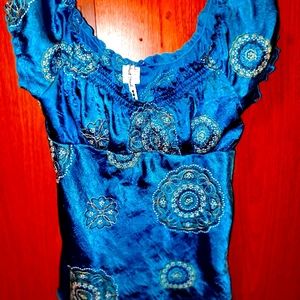 Size XL silk, made in China. Very sexy on.